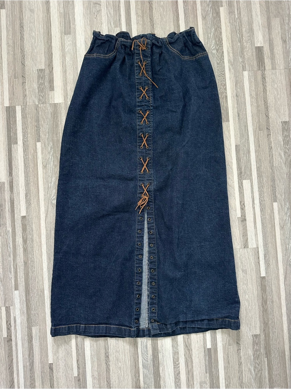 Starwear long skirt, 1990s, with a front slit and lace-up closure. Size 15/